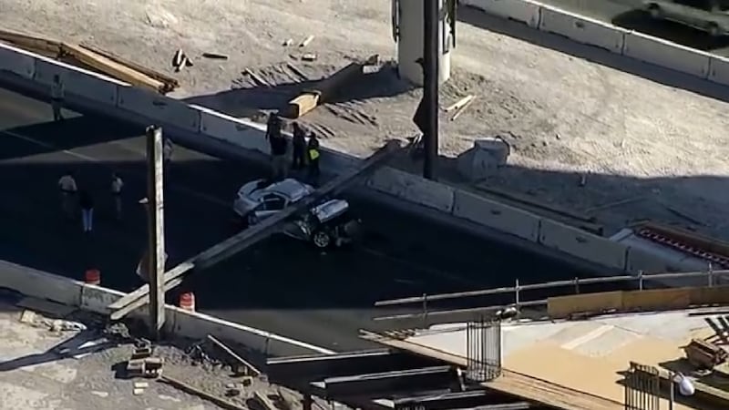 Driver dead after beam falls on top of car